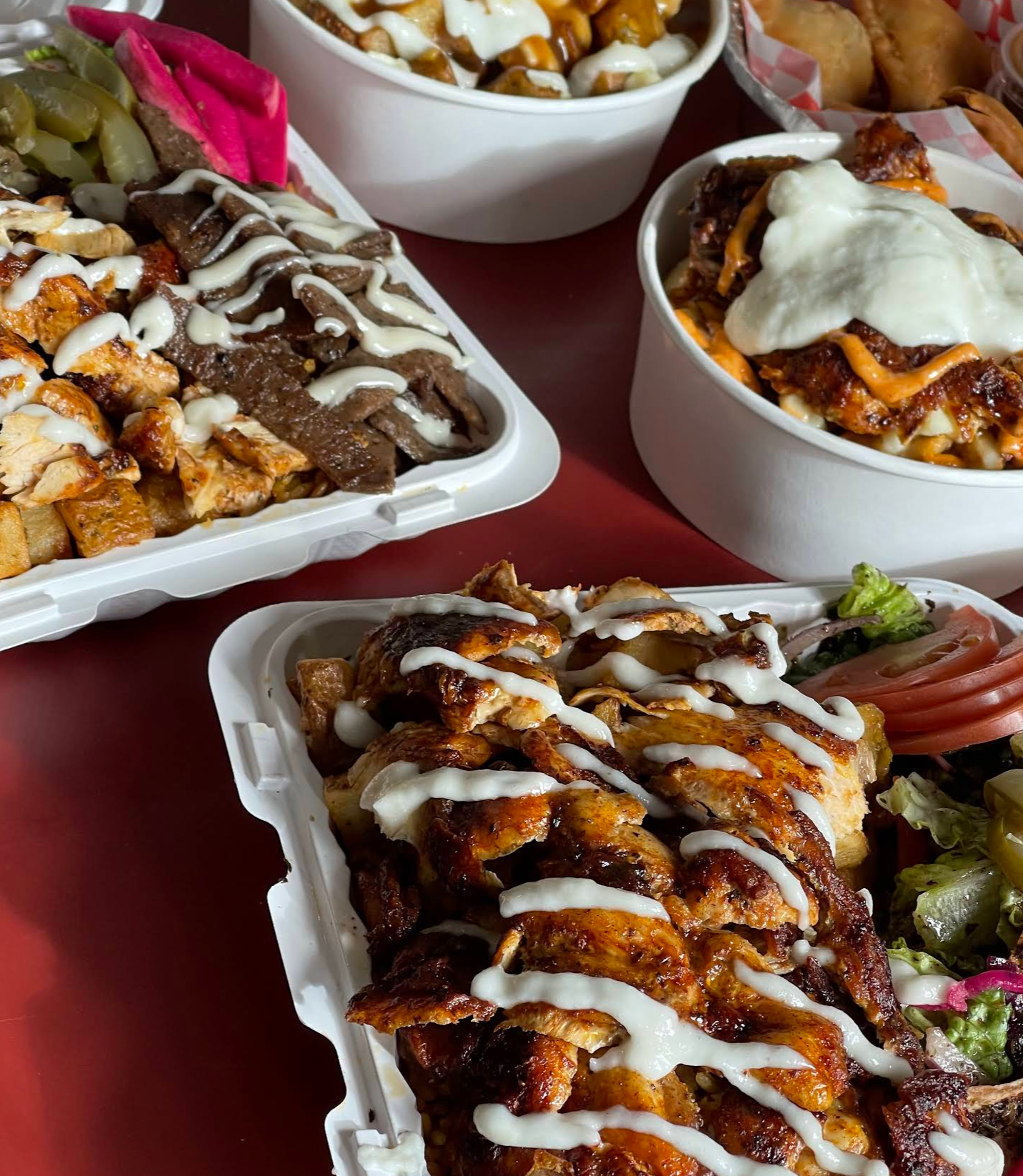 Big H Shawarma & Poutine  logo